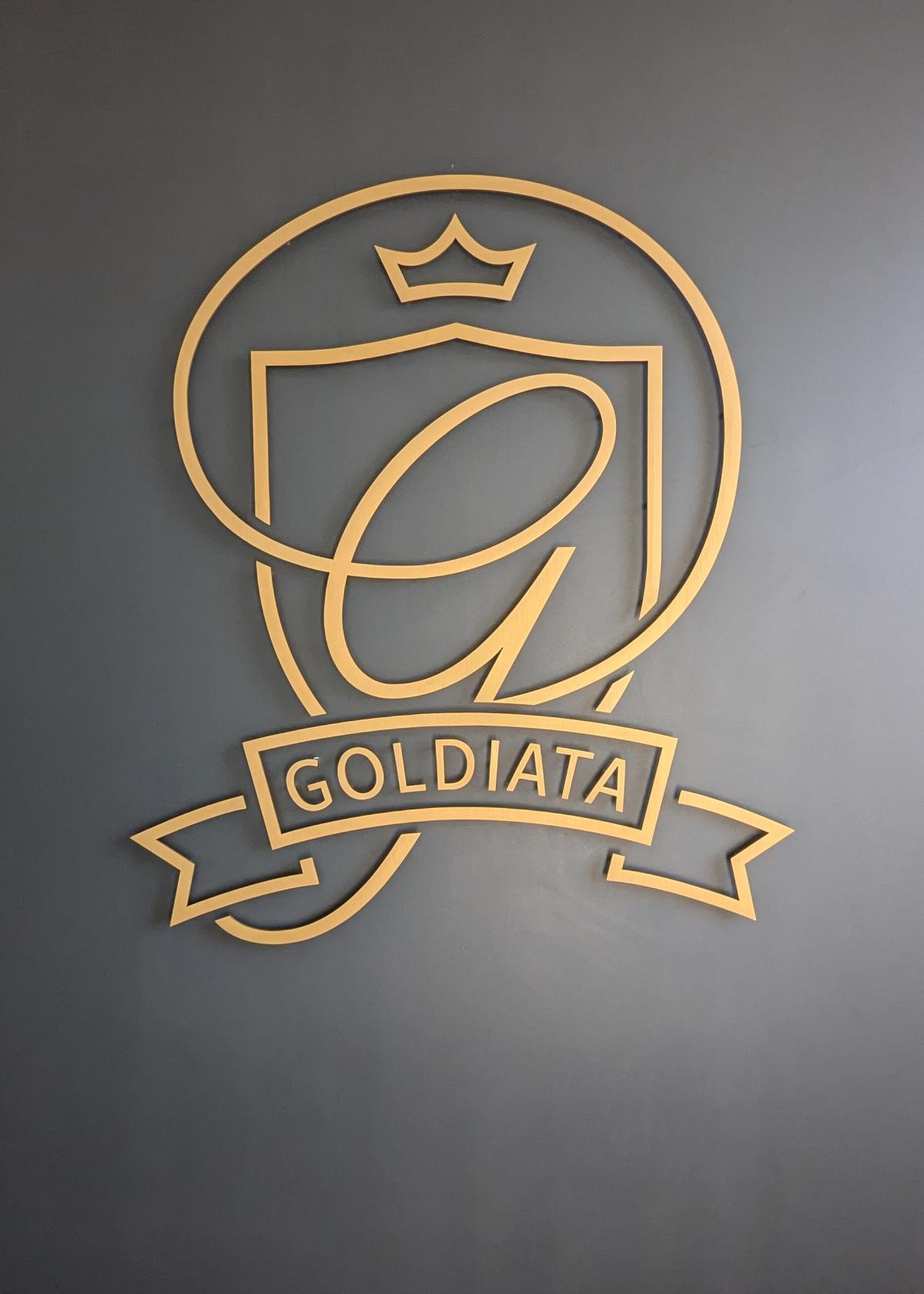 Goldiata installed custom brass sign